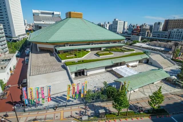 The exterior of Ryogoku Kokugikan and the surrounding Ryogoku neighborhood in Tokyo