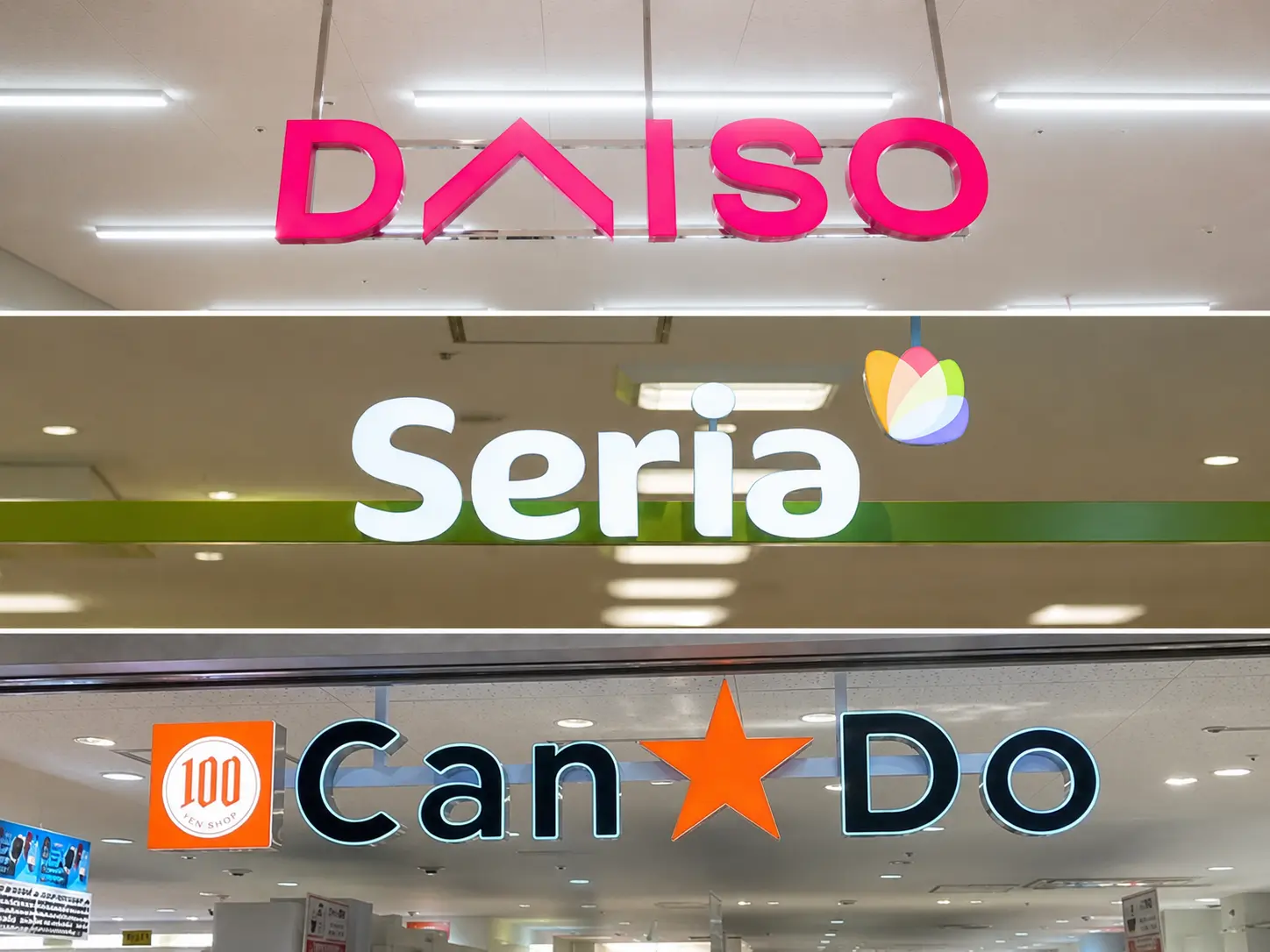 日本の代表的な100円ショップ3社の店舗看板を縦に並べた画像。上からピンク文字の「DAISO(ダイソー)」、緑地に白文字の「Seria(セリア)」、「100 YEN SHOP」マーク付きの「Can★Do(キャンドゥ)」。